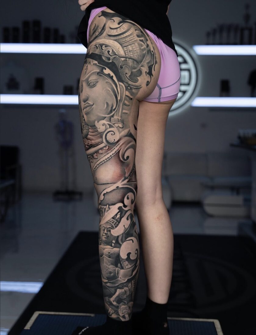 Black and grey realism full leg sculpture sleeve by Robert Pho