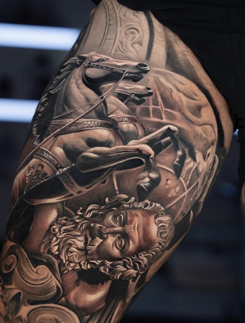Black and grey realism chariot and horses tattoo by Robert Pho