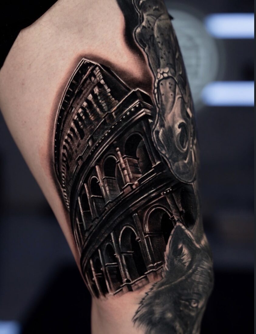 Black and grey realism Colosseum architecture tattoo by Robert Pho